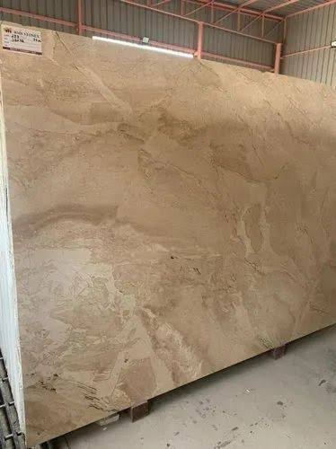 Upright Dyna Beige marble slab with layered tan movement
